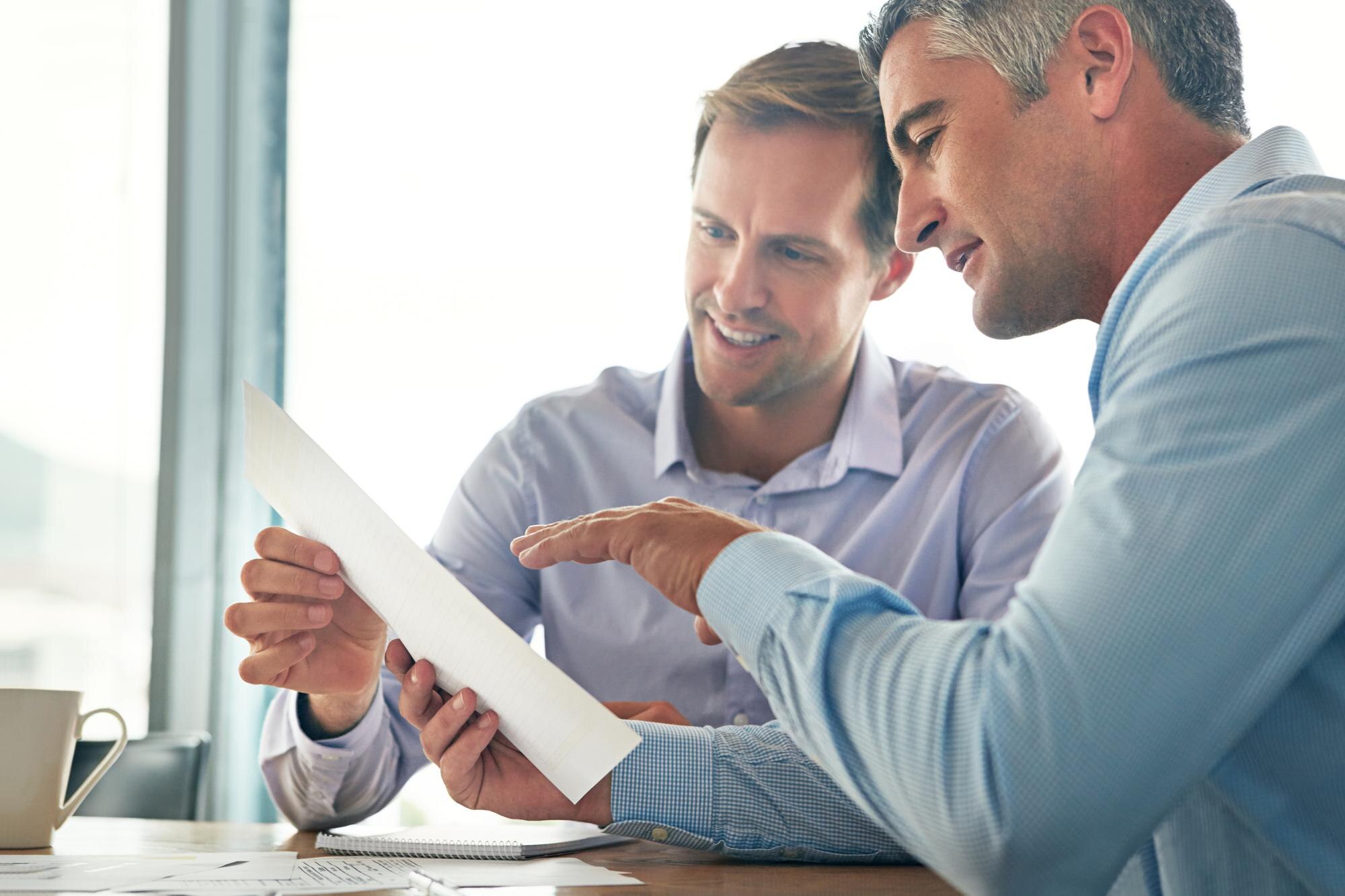 paperwork meeting business men planning with spreadsheet data analysis statistics report budget prof